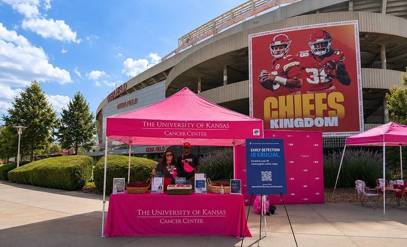 Branded canopy tent at a community event, demonstrating outdoor shelter solutions for schools, fundraisers, awareness campaigns, and public gatherings.